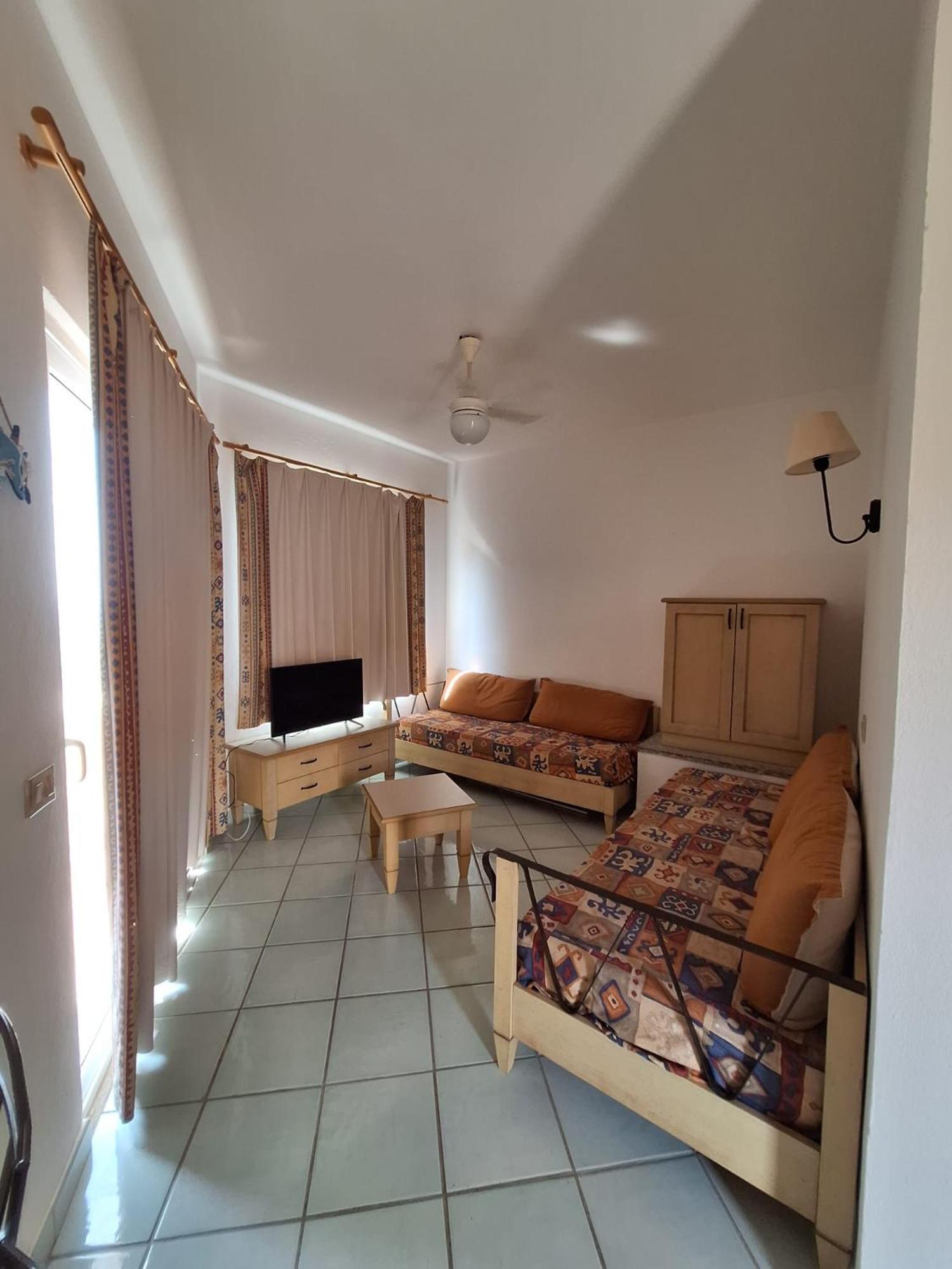 Apartamento Rocciarossa Isola Rossa Exterior foto